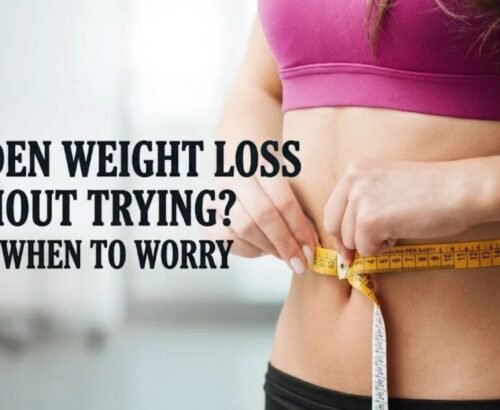 Person checking body weight on a weighing scale to monitor unexplained weight loss.
